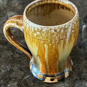Handcrafted Ceramic Mug with Earthy Tones